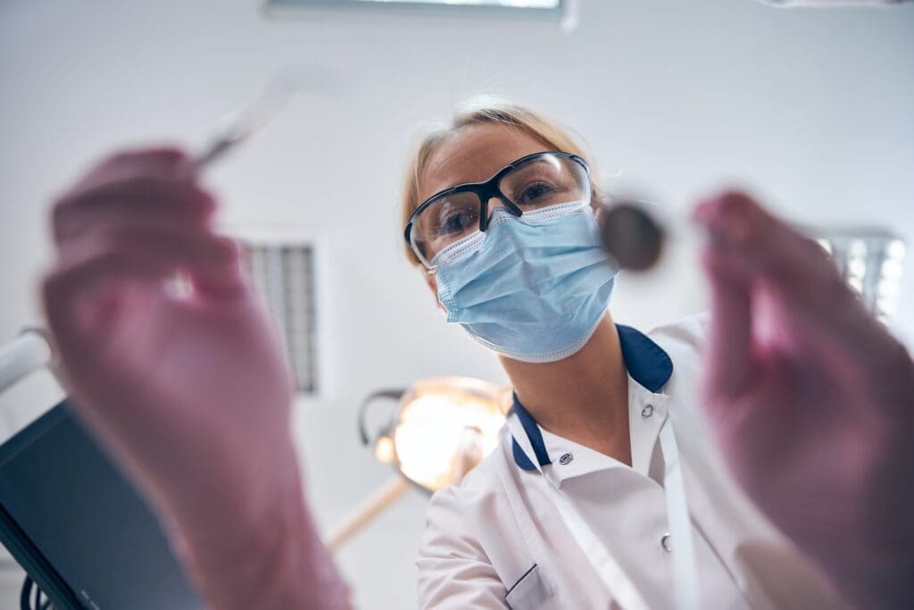 A person getting root canal treatment at Waban Dental Group in Newton, MA.