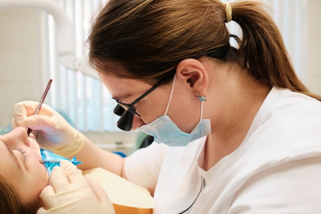 A patient at Waban Dental Group experiencing the iTero digital impression technology for a dental check-up.