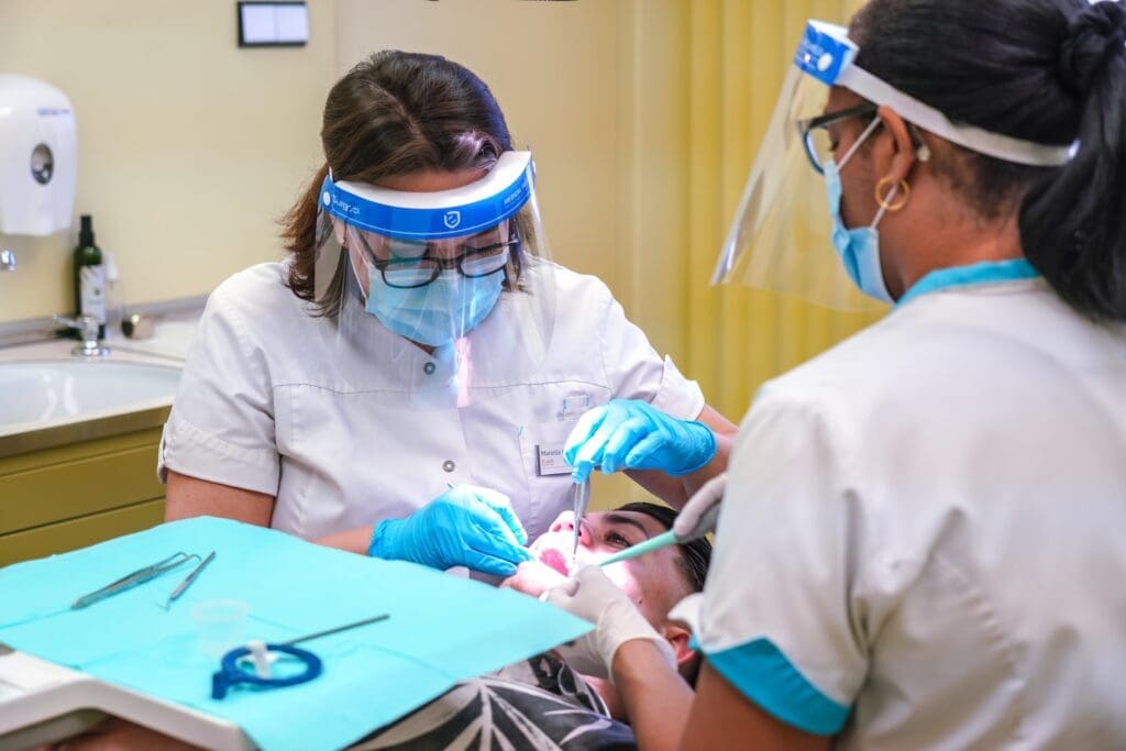 Illustration depicting a person learning about dental emergencies, provided by Waban Dental Group, Newton, MA.