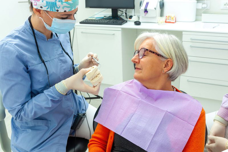 Patient and dentist talking during consultation.