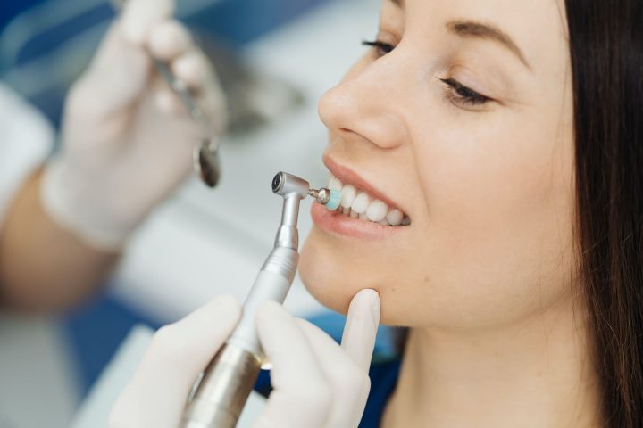 Healthy Teeth, Healthy Life: The Value of Regular Cleanings A person smiling after a dental cleaning, highlighting the importance of regular cleanings.