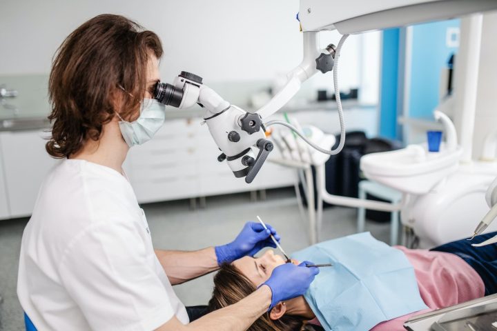 Choosing Your Path to a Brighter Smile: Professional vs. At-Home Teeth Whitening A patient comparing professional teeth whitening results with at-home kits, guided by the best dentist in Newton, MA.
